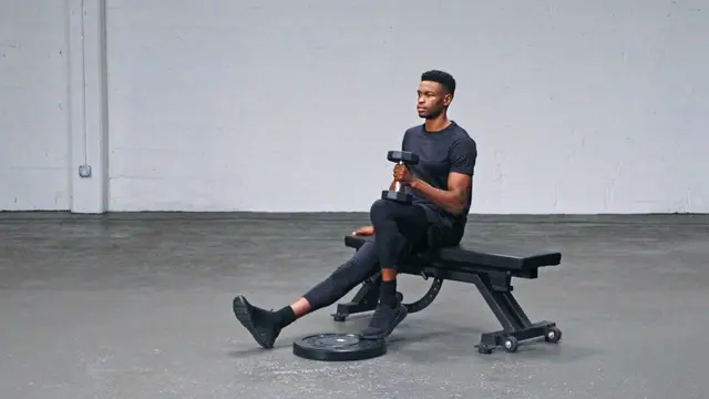 Seated Dumbbell One-Leg Calf Raise exercise being performed