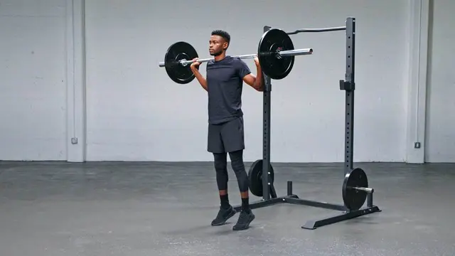Standing Barbell Calf Raise exercise being performed