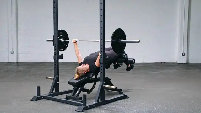 Pause Barbell Decline Bench Press exercise being performed